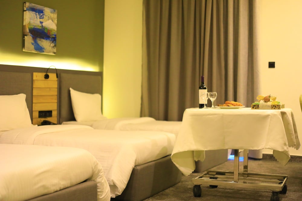 Deluxe Triple Room - Photo 8