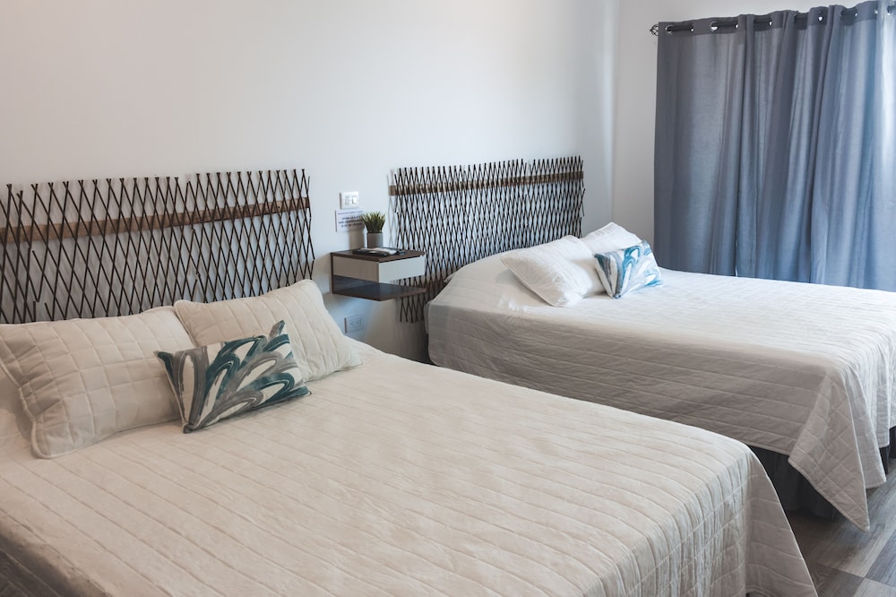 Habitación Doble Deluxe, 2 Camas Queen, Baño Privado, Vista a la Playa