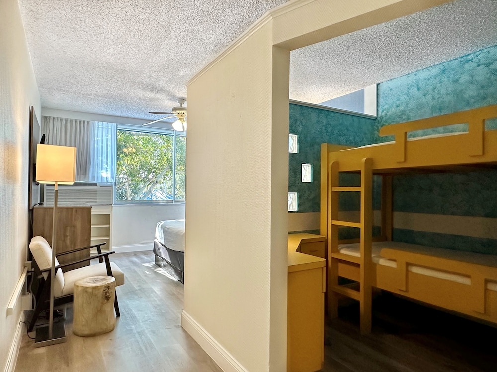 Family Room, Multiple Beds, Refrigerator & Microwave - Photo 1