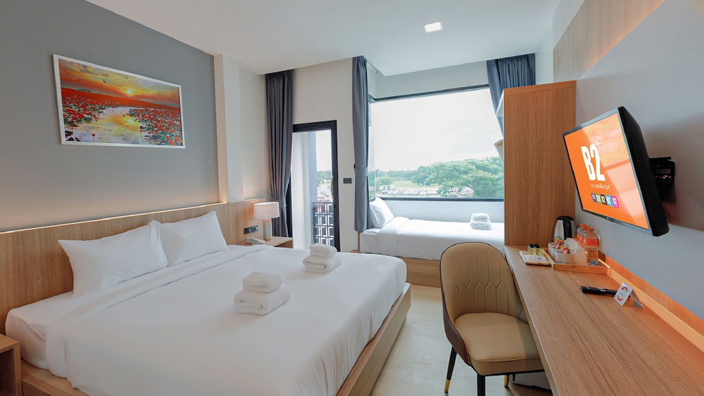 Deluxe Triple Room - Photo 1
