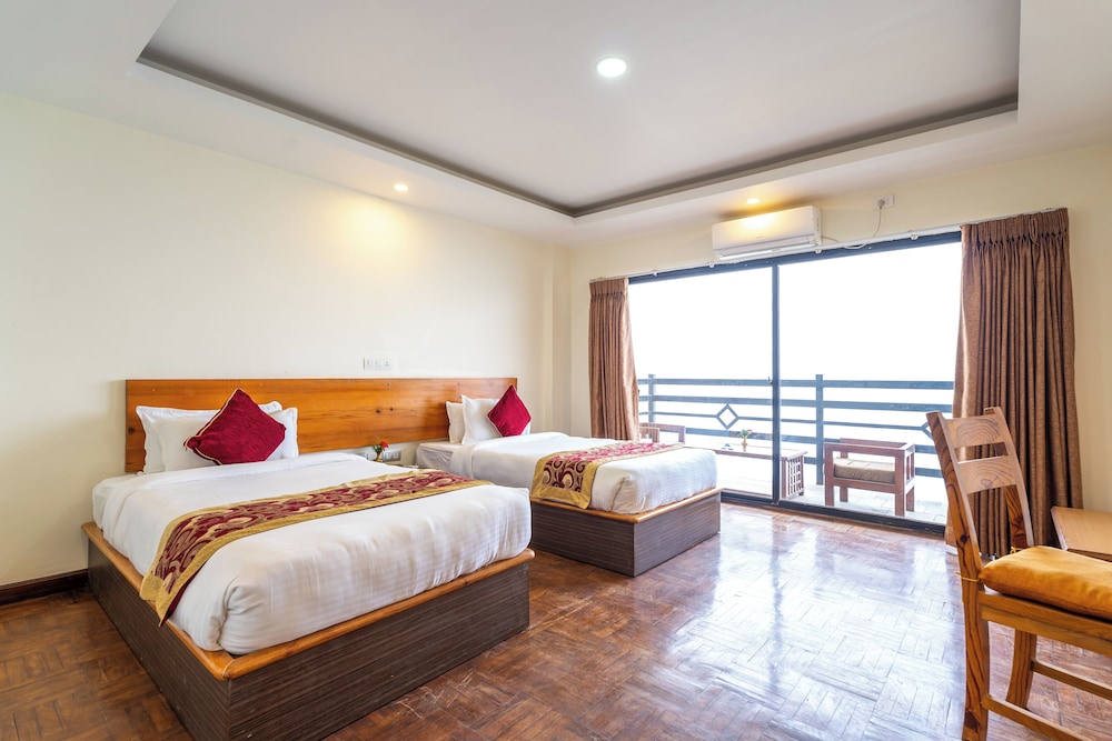Deluxe Room - Photo 1