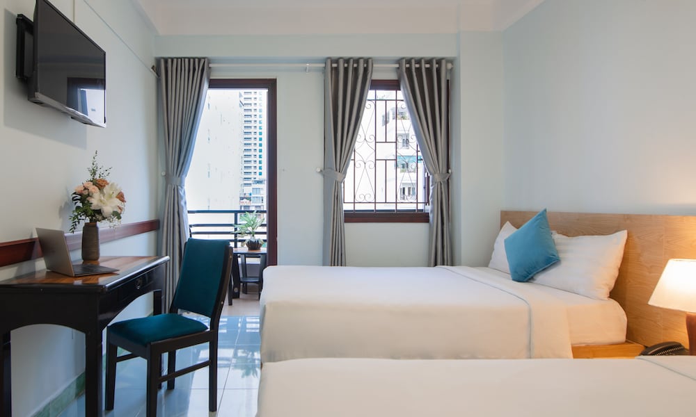 Deluxe Quadruple Room - Photo 7