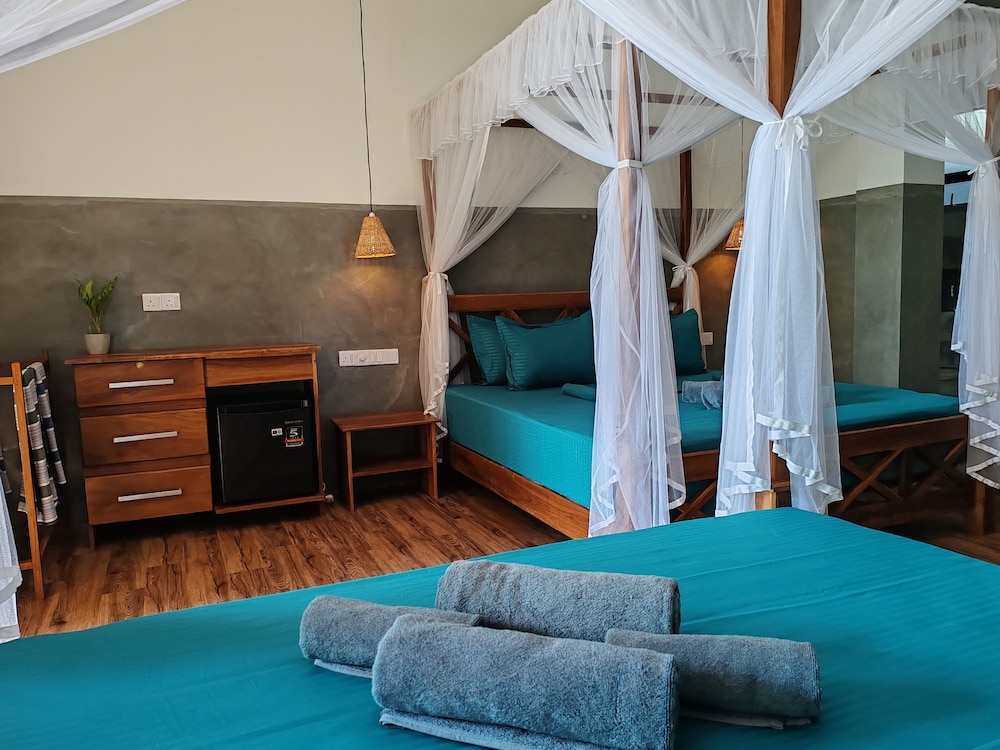 Deluxe Quadruple Room, Balcony, Garden View