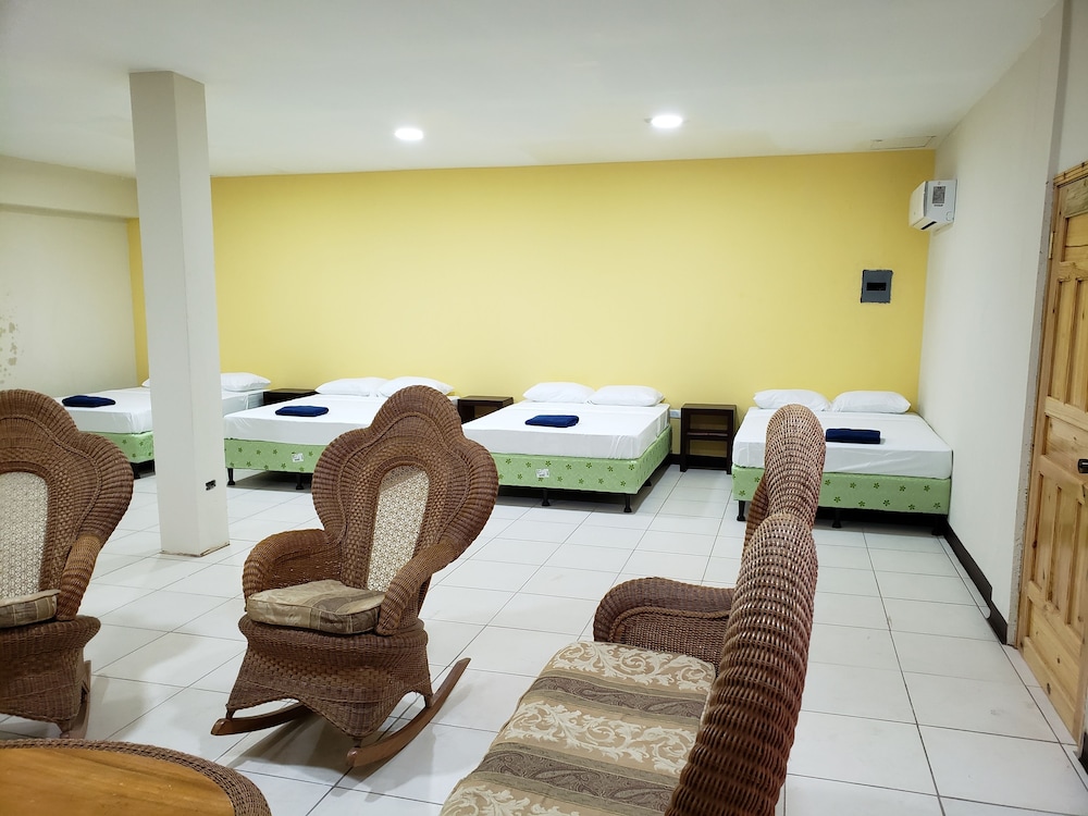 Basic Quadruple Room, Multiple Beds, Private Bathroom, Courtyard Area photo 1
