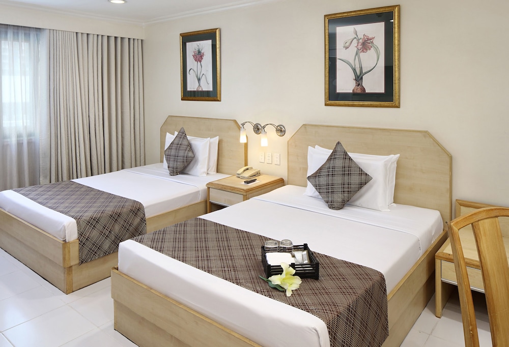 Deluxe Room with Kitchenette - Photo 1