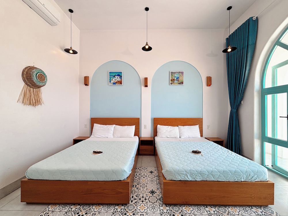 Deluxe Quadruple Room, Balcony, Garden View