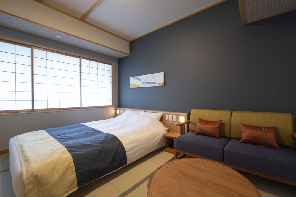 Basic Double Room, 1 Queen Bed, Non Smoking - Photo 1