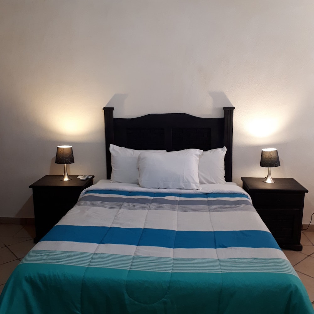Triple Room (1 Double and 1 Single Bed)