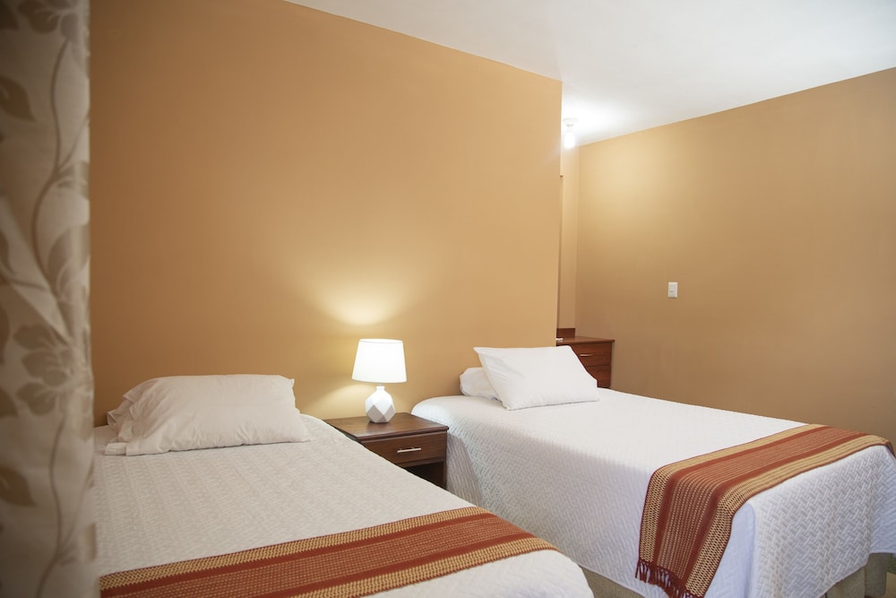 Standard Double Room (1 Full, 1 Twin Beds) photo 1