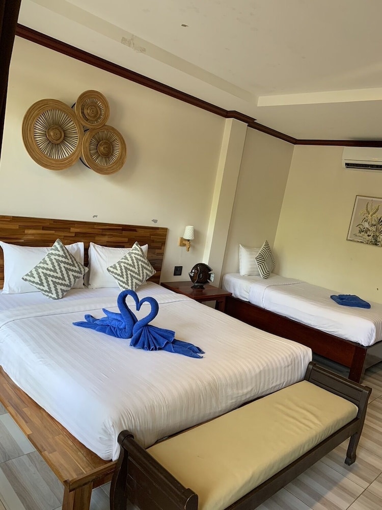 Premium Triple Room - Photo 1