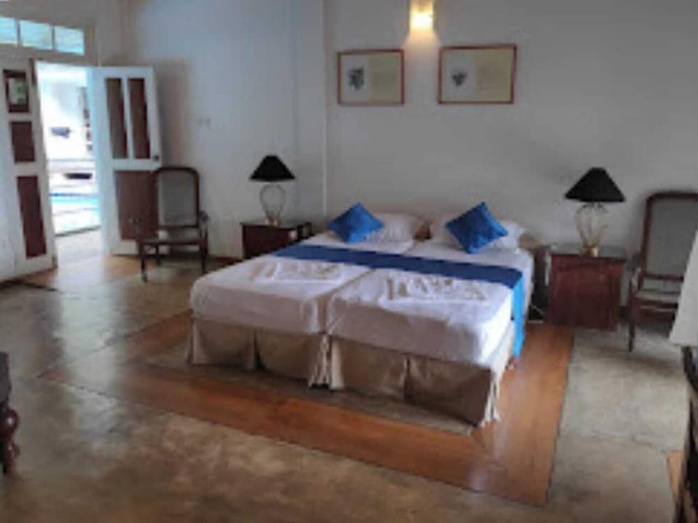 Deluxe Quadruple Room, Pool View photo 1