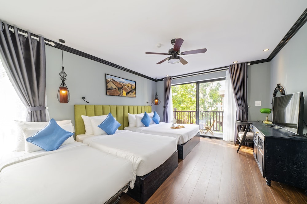 Deluxe Triple Room - Photo 1