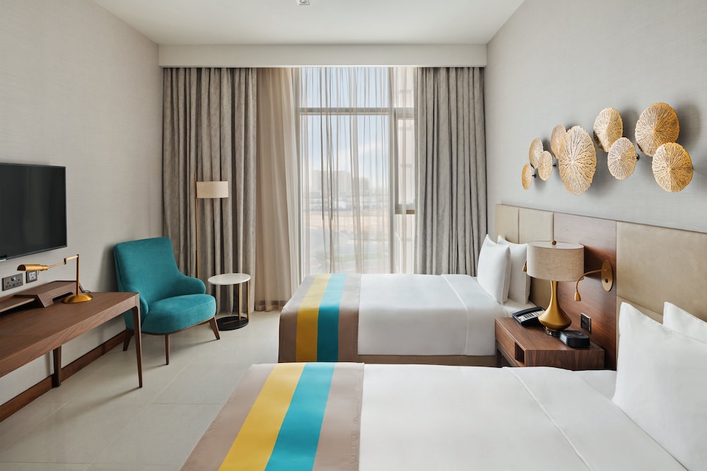 Standard Room, Free bus: DIP Metro, Ibn Battuta Mall, JBR Beach, DWC Airport, (Pre Book Bus)