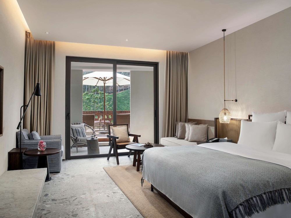 Deluxe King Bed Room - Photo 1