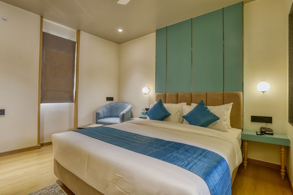 Deluxe Room - Photo 1
