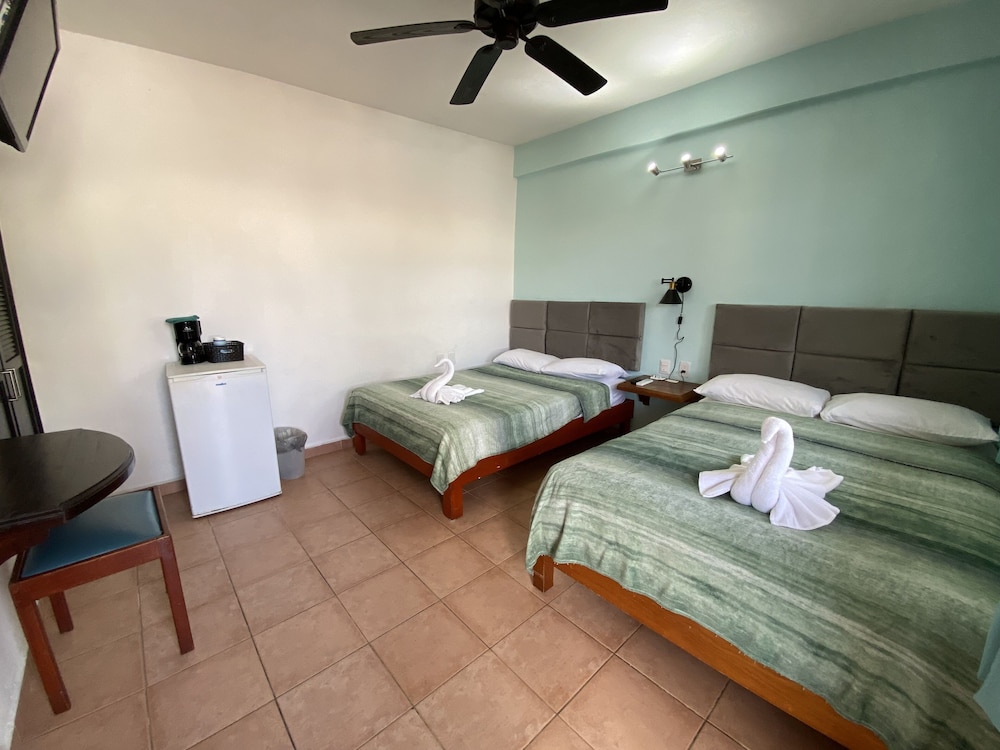 Family Room, 2 Double Beds (with Fan and AC) photo 2