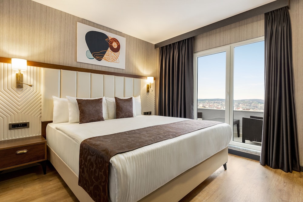 Deluxe Room, Balcony - Photo 1