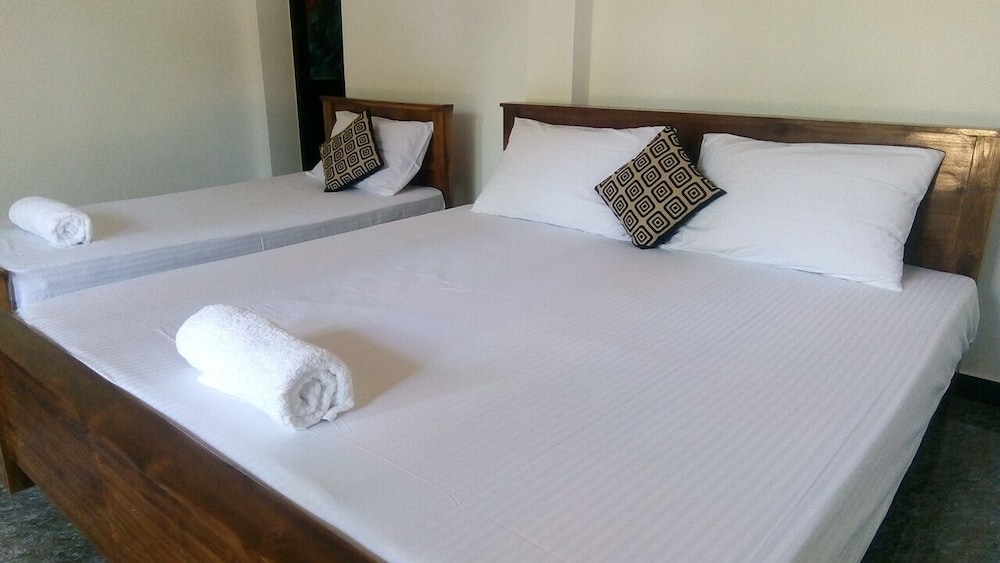 Deluxe Room, Multiple Bedrooms, Balcony, Garden View photo 1
