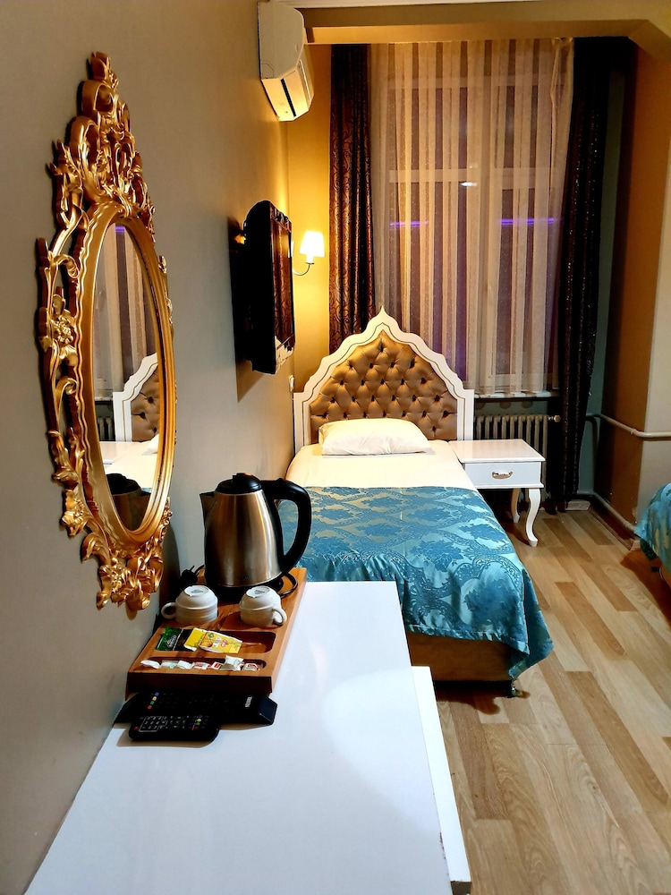 Standard Quadruple Room, City View photo 2