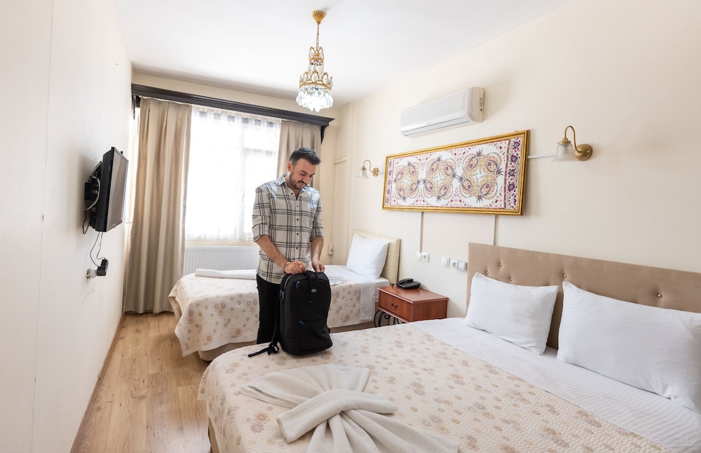 Standard Triple Room - Photo 8