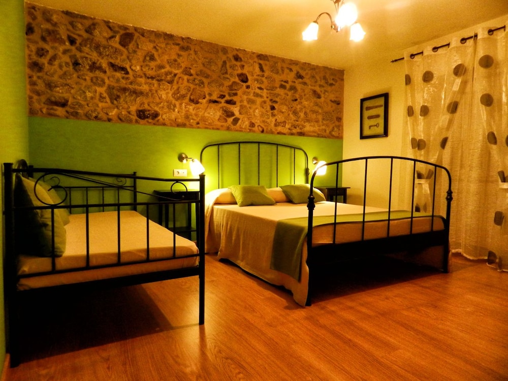 Habitación Triple Superior con vista al jardín