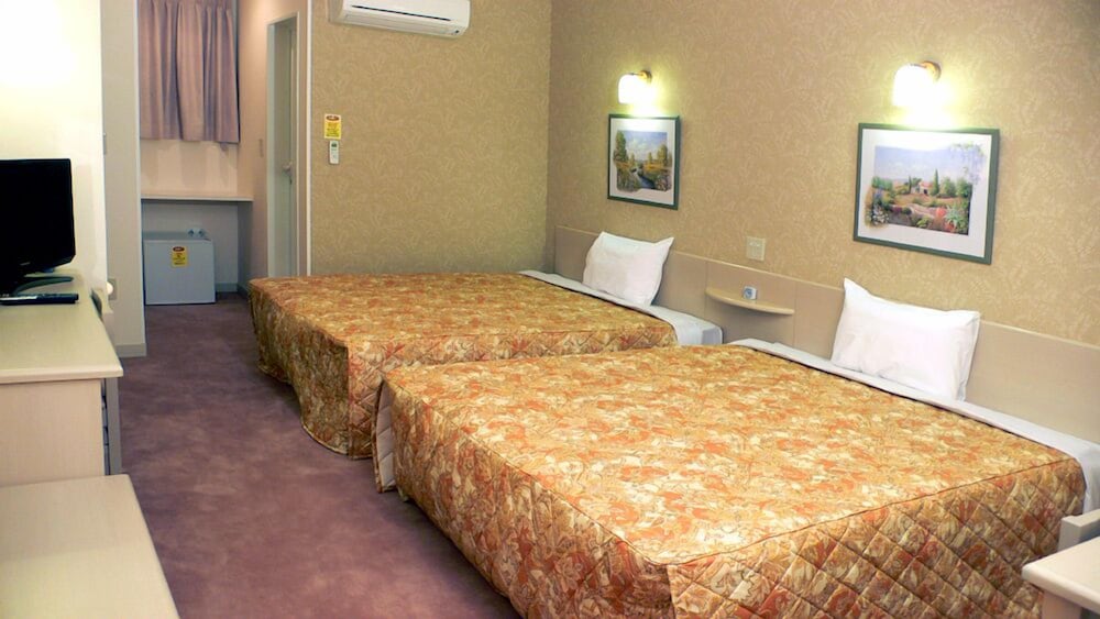 Standard Twin Room, 2 Queen Beds, Smoking photo 1