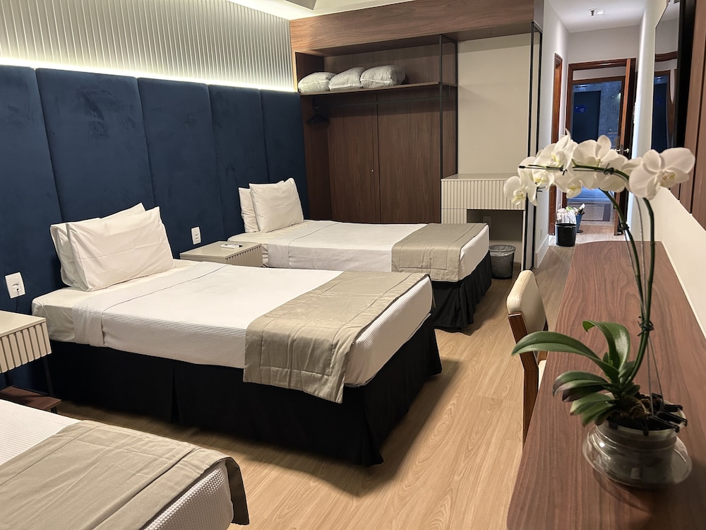 Deluxe Triple Room - Photo 9
