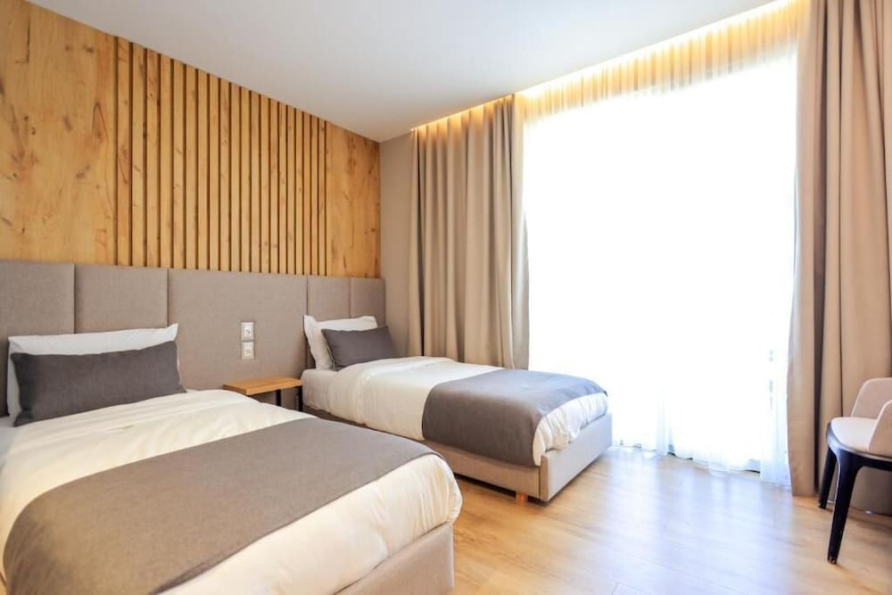 Deluxe Quadruple Room, Balcony, Partial Sea View