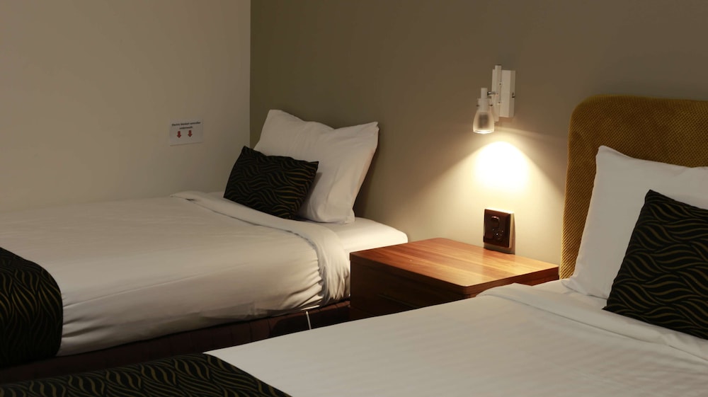Deluxe Triple Room, 1 Bedroom, Kitchenette photo 3