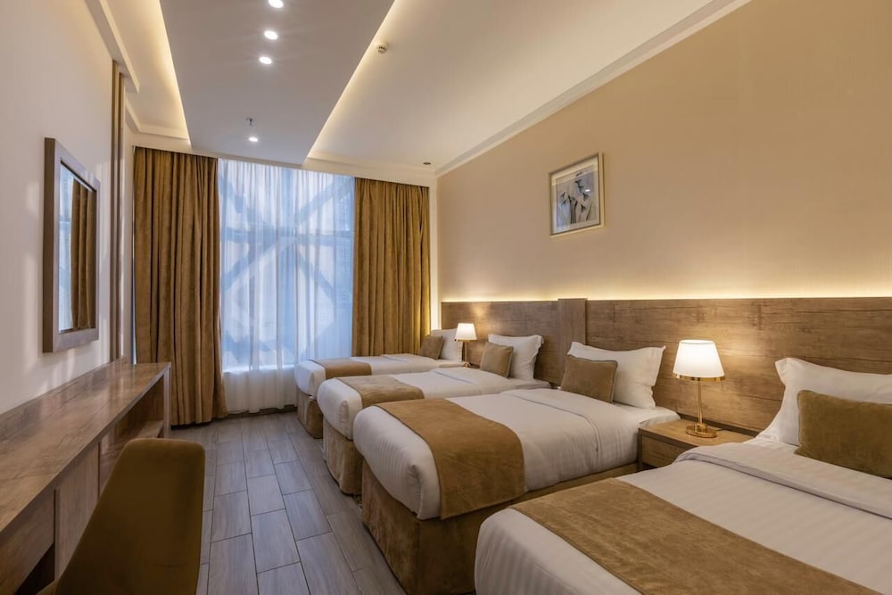 Quadruple Room - Photo 1