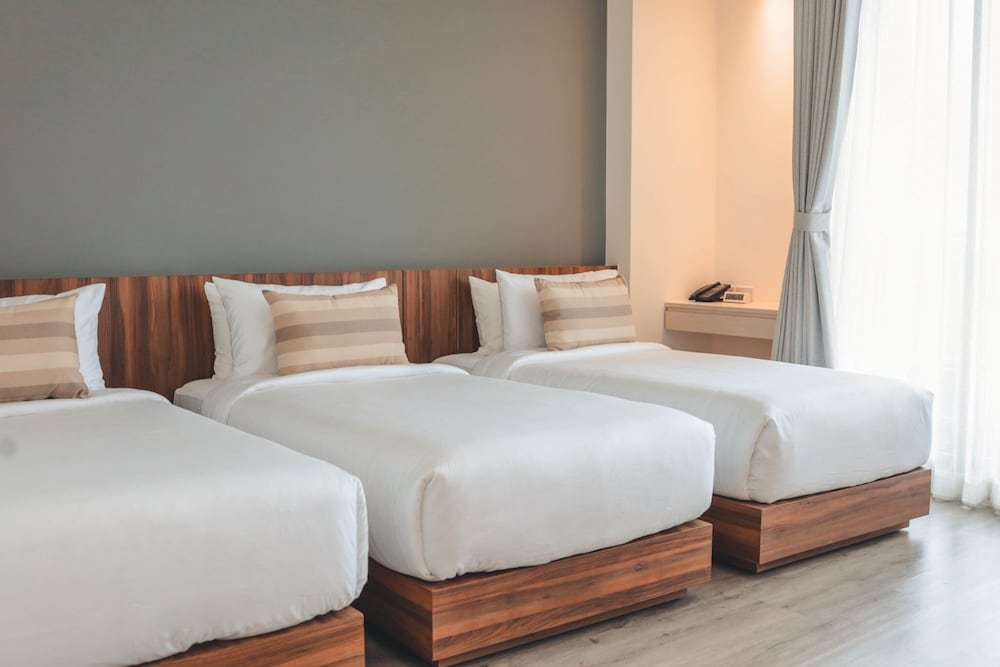 Deluxe Triple Room, Non Smoking, Private Bathroom - Photo 1