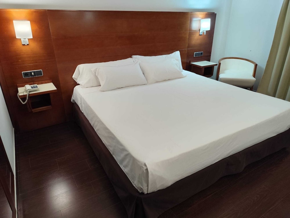 Habitación Doble Estándar o con Dos Camas Individuales.