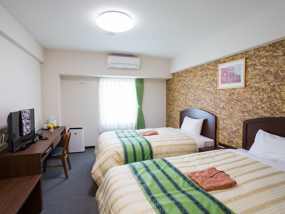 Twin Room (1 person only), Non Smoking - Photo 1
