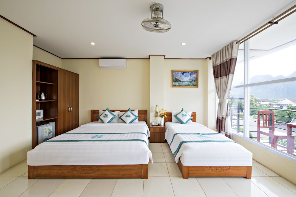 Deluxe Family Room with balcony photo 1