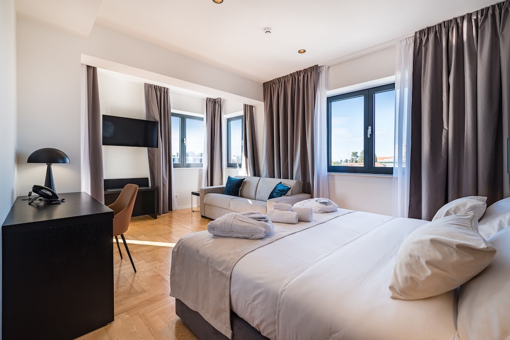 Deluxe Room - Photo 1