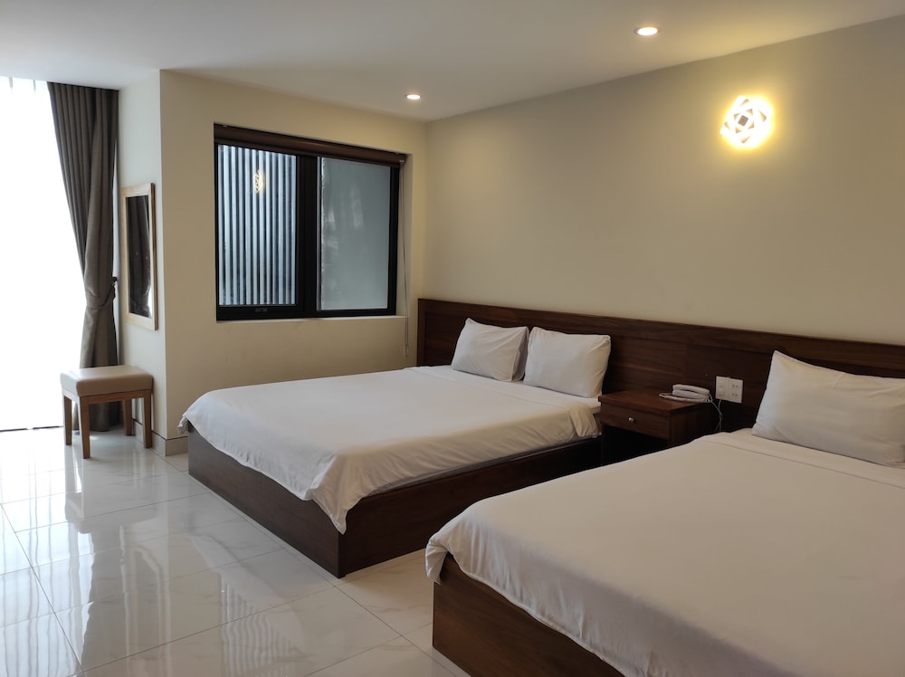 Deluxe Quadruple Room, Partial Ocean View - Photo 3