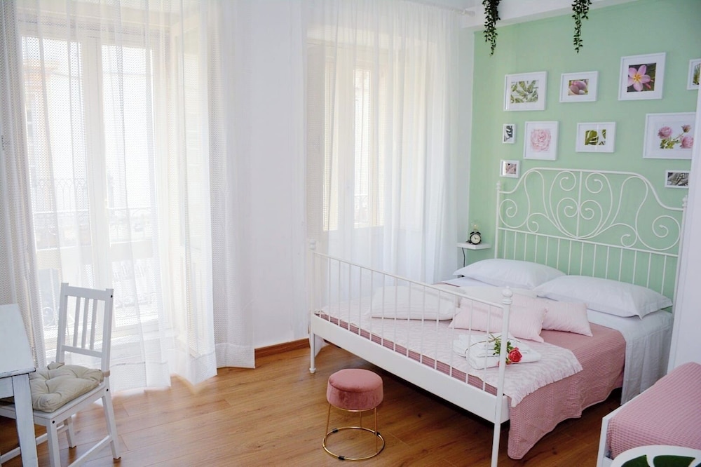 Quadruple Room, Balcony, City View