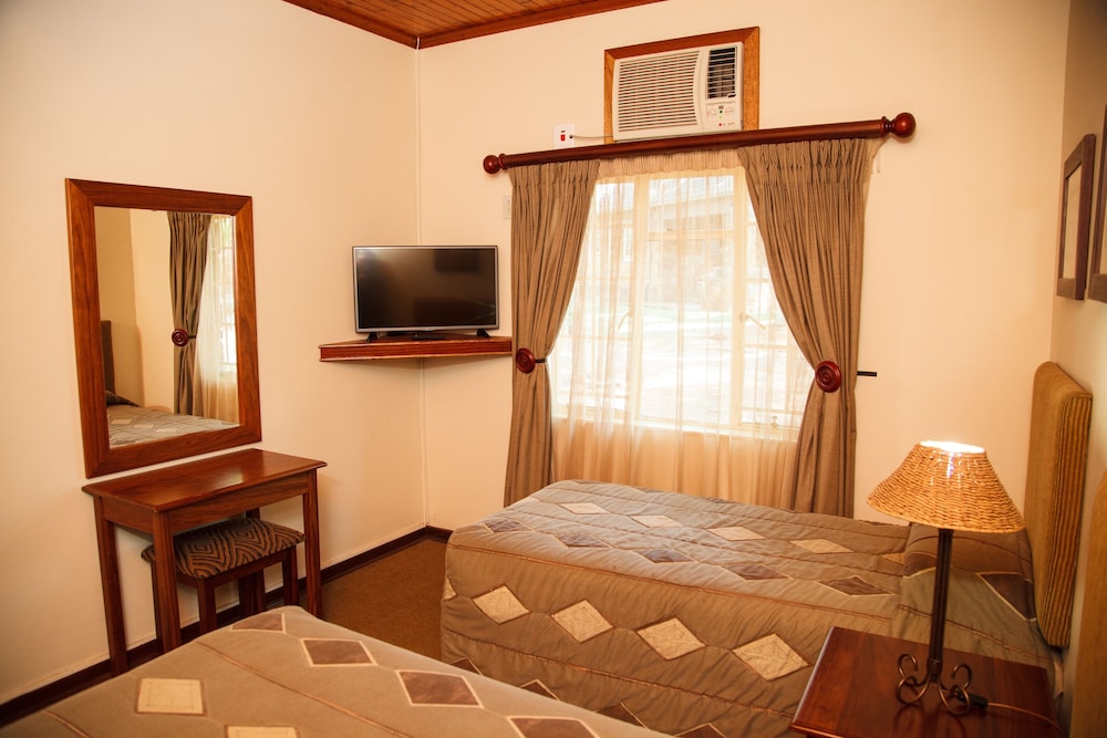 Classic Chalet, 2 Twin Beds, Resort View, Garden Area photo 3