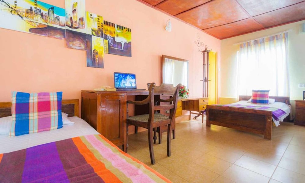 Deluxe Triple Room, Multiple Beds, Private Bathroom, Hill View photo 1