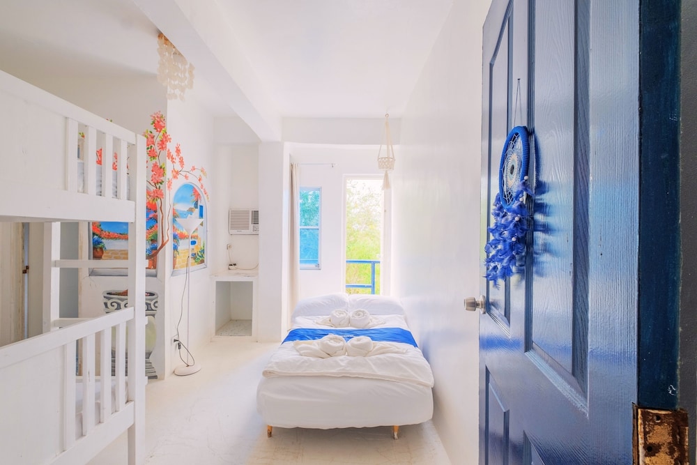 Deluxe Quadruple Room - Photo 8