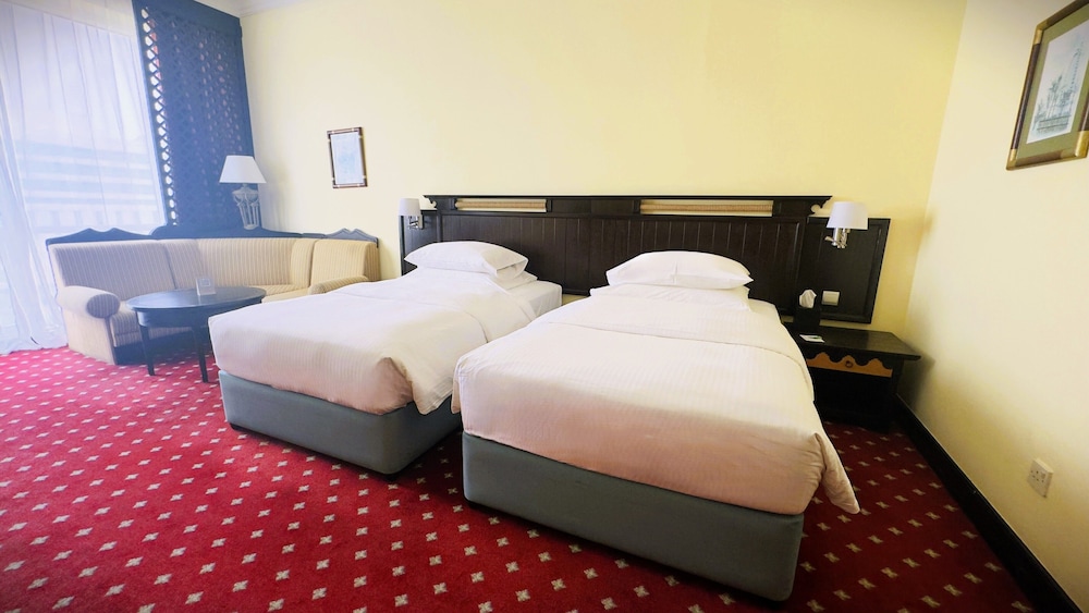 Deluxe Room, 2 Twin Beds complimentary shuttle to DXB Airport Terminal 1 & 3 photo 2