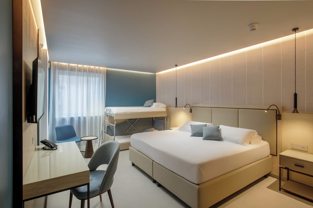 Deluxe Quadruple Room, Balcony, Partial Sea View
