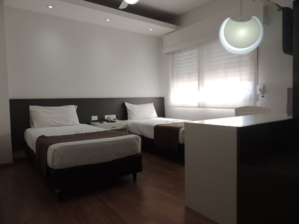 Standard Quadruple Room, Private Bathroom (4 Single Beds )