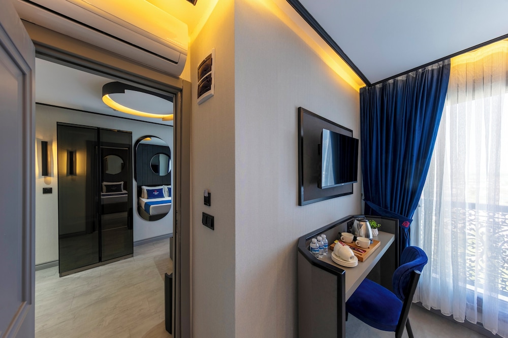 Deluxe Quadruple Room - Photo 6