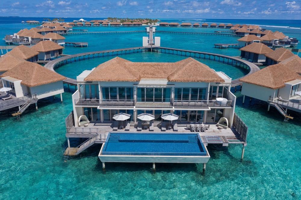 Presidential three bedroom over water pool villa with free access to VIP seaplane lounge on arrival