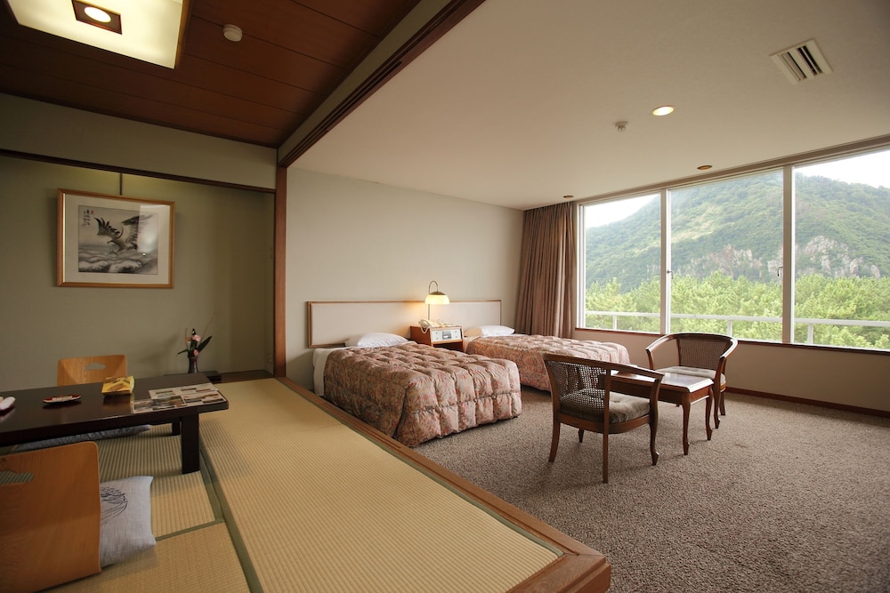 Satsuma Kyakuden Semi Western-style Room with 2 beds + Japanese Futon (For Single use)