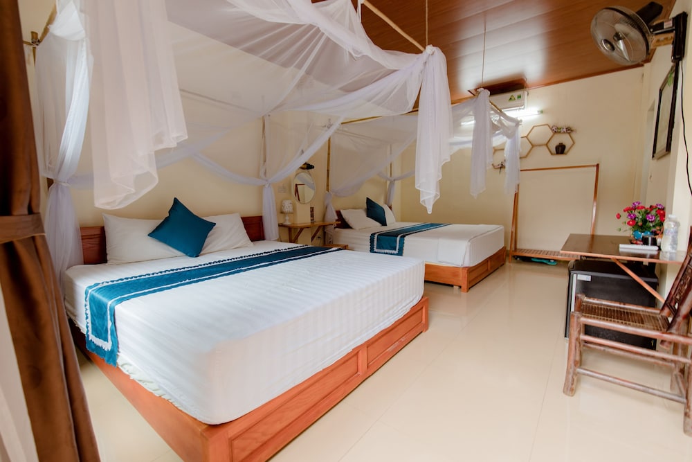 Deluxe Triple Room, Garden View photo 1