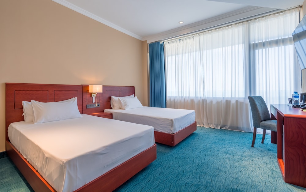 Standard Twin Room - Photo 4