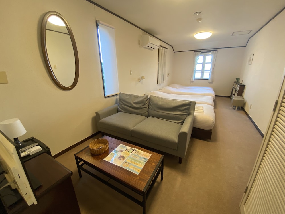 Deluxe Triple Room, 3 Twin Beds, Ocean View photo 3