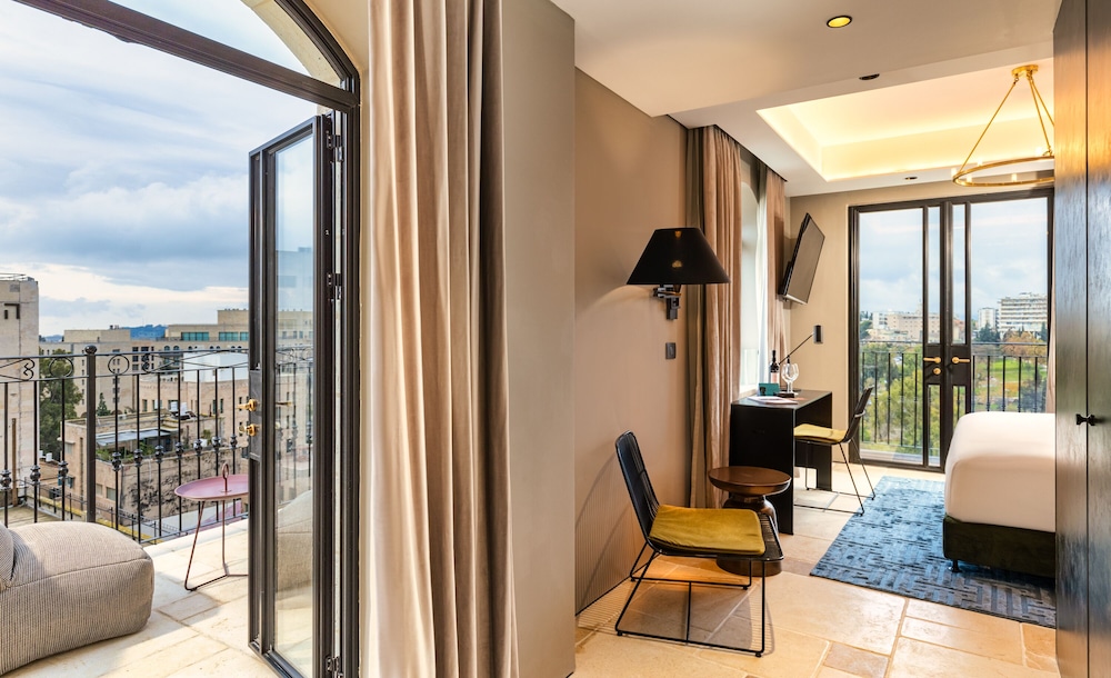 Deluxe Room with Balcony - Photo 1